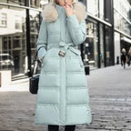 Women’s Belted Long Puffer Coat – Faux-Fur Hooded Quilted Winter Outerwear with Defined Waist and Extended Cold-Weather Coverage