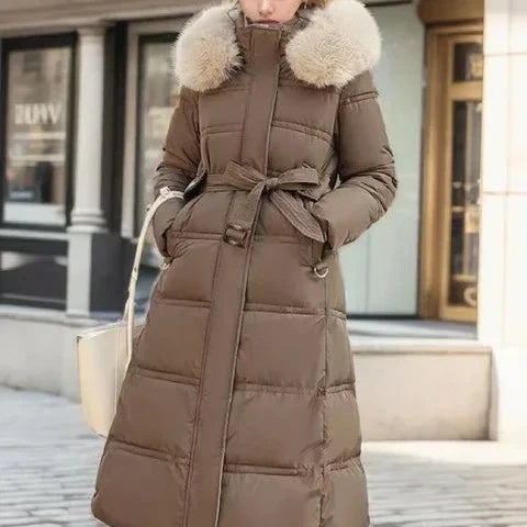 Women’s Belted Long Puffer Coat – Faux-Fur Hooded Quilted Winter Outerwear with Defined Waist and Extended Cold-Weather Coverage